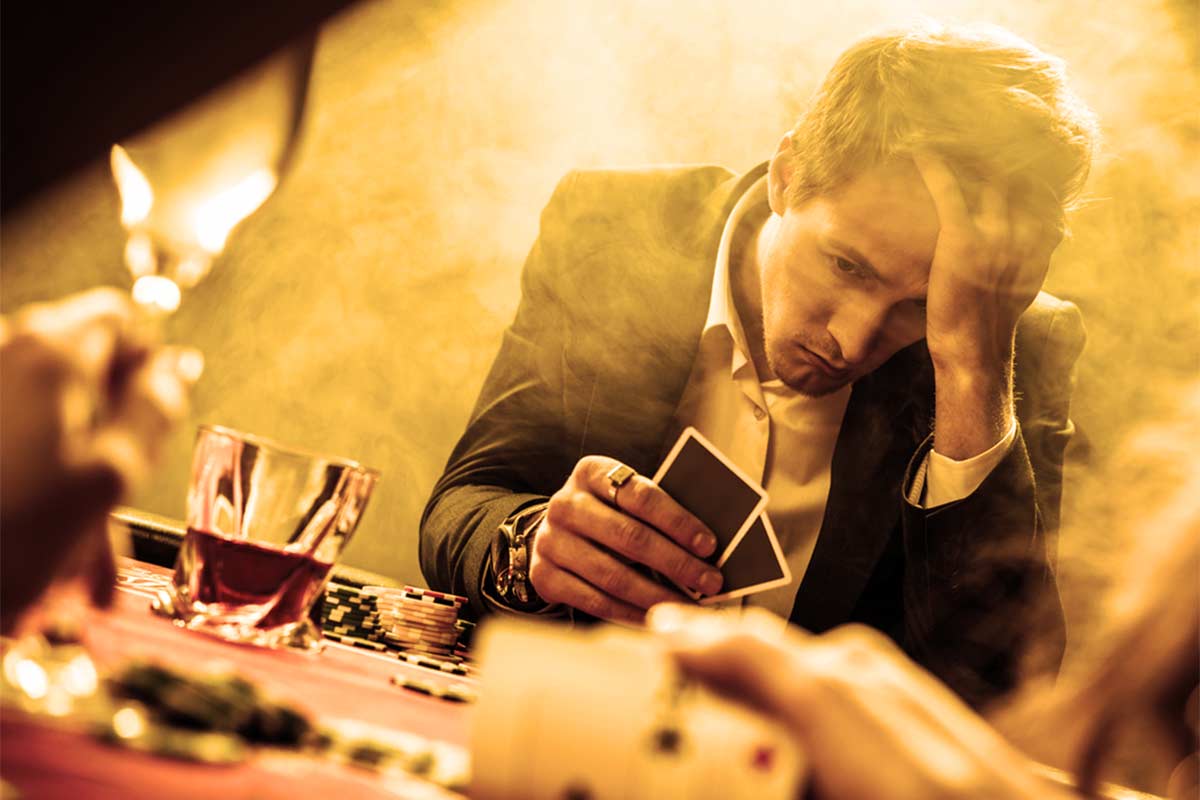 Man with poker cards